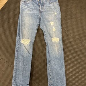 Levi’s 501 distressed jeans